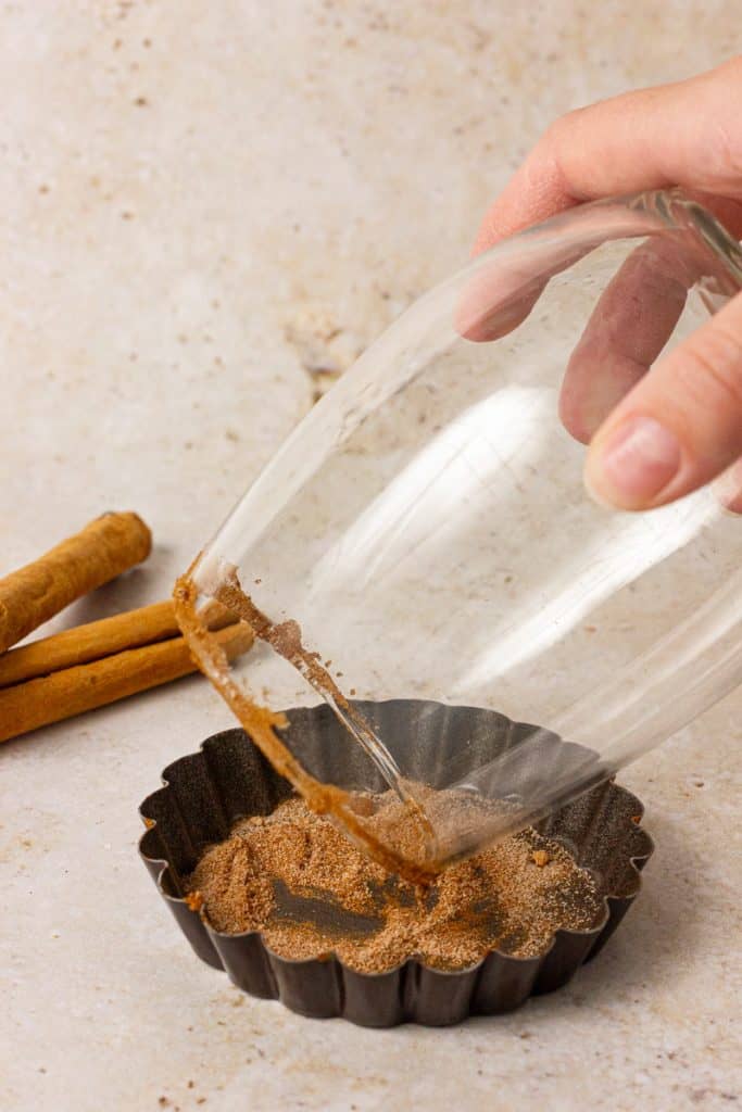 rimming a glass with cinnamon sugar
