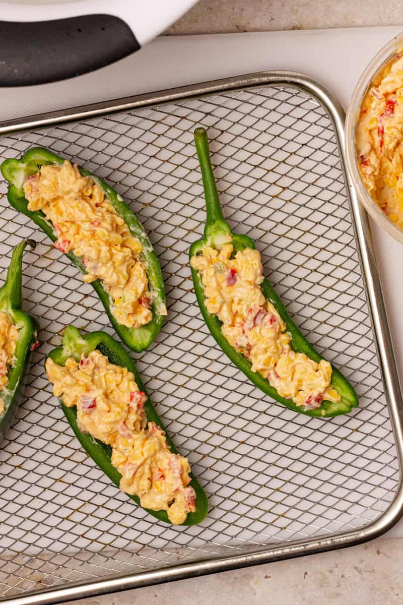 uncooked jalapeno poppers stuffed with pimento cheese
