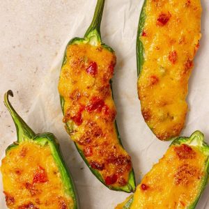 pimento cheese jalapeno poppers on a table