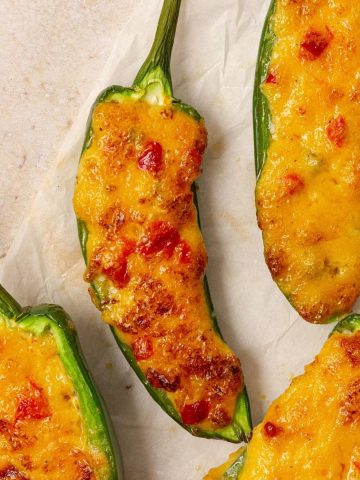 pimento cheese jalapeno poppers on a table