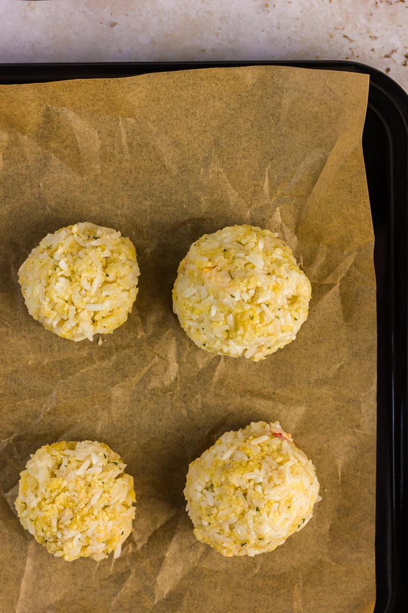 Assembled pimento cheese rice balls ready for air frying.