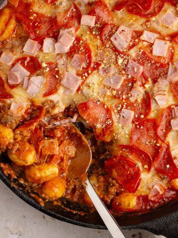 A close-up of the finished Pizza Gnocchi, highlighting the gooey cheese, crispy pepperoni, and tender gnocchi.