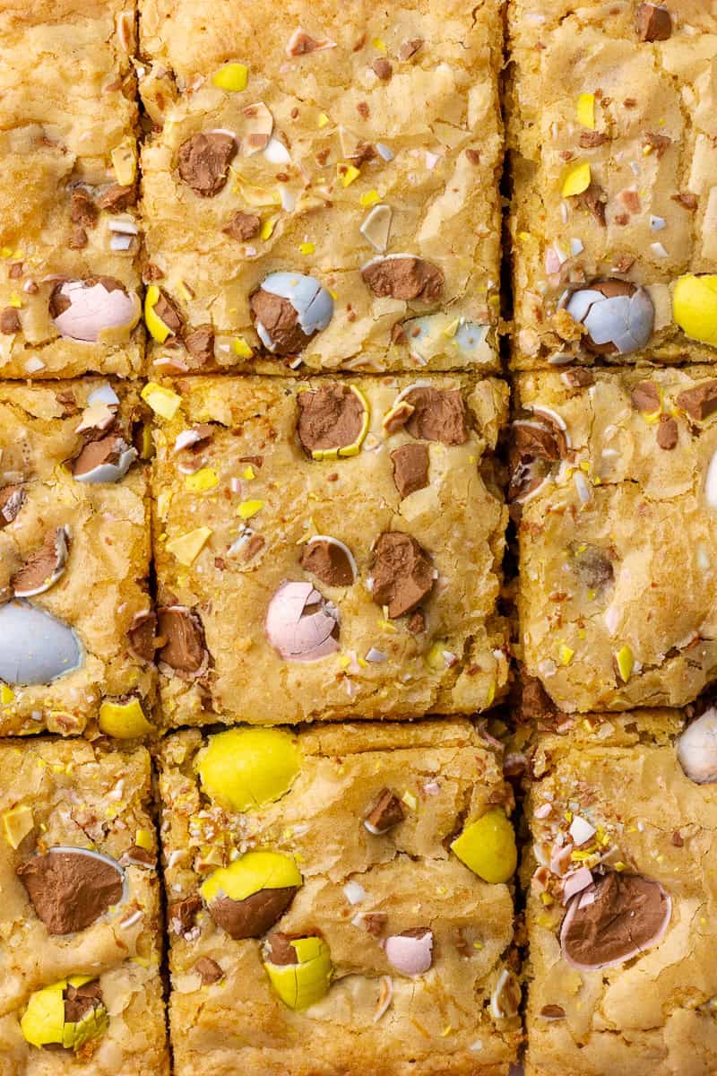Close up of baked Cadbury egg cookie bars sliced into squares.