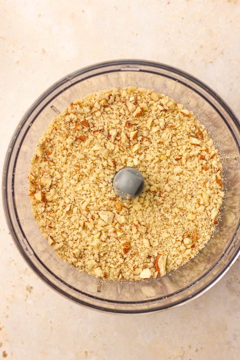 Coarse pecan and panko breadcrumb mixture pulsed in a food processor.