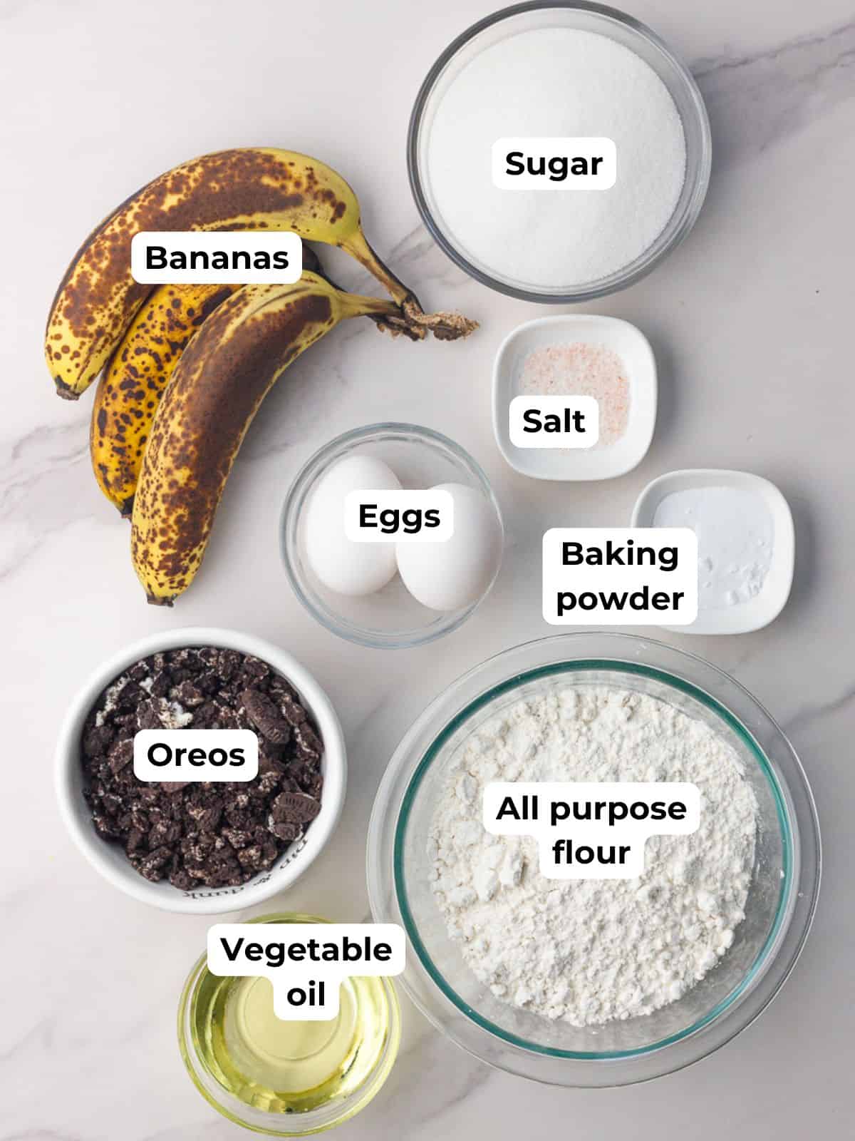 Overhead image of labeled ingredients for cookies and cream banana bread.