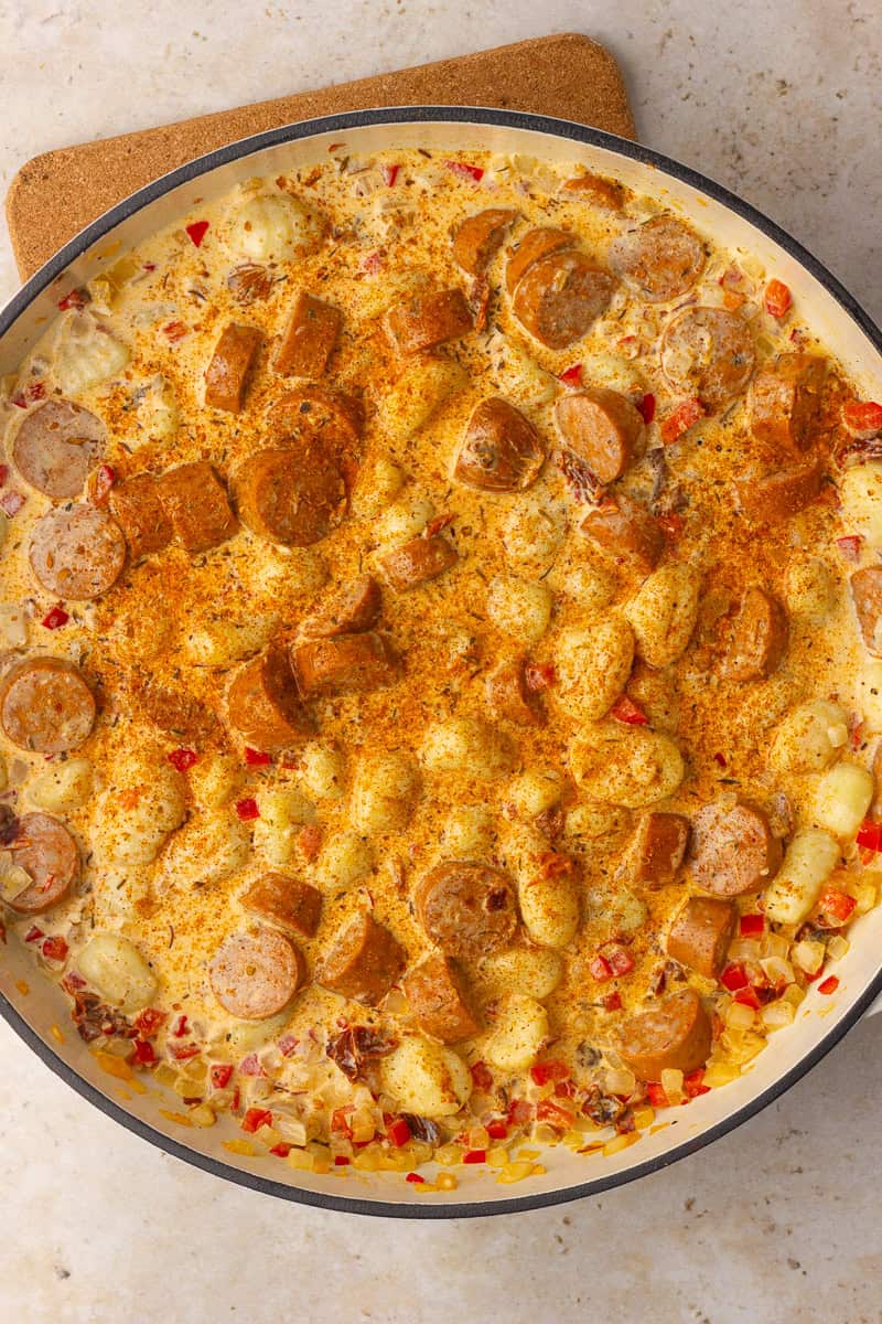Potato gnocchi and Cajun seasoning are stirred into the creamy sausage sauce before baking.