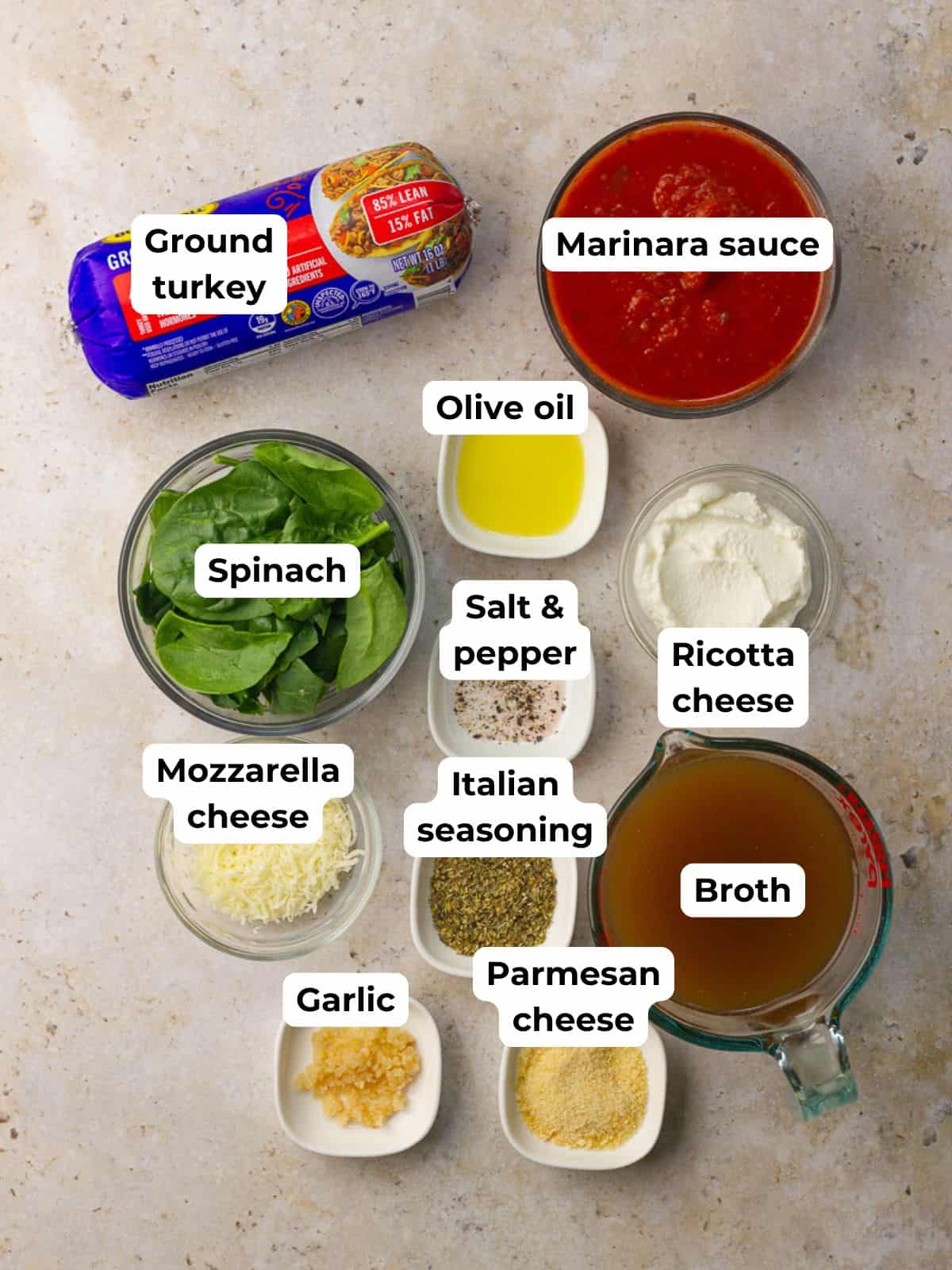 An overhead layout displays the ingredients for crockpot lasagna soup including ground turkey, marinara, broth, cheeses, spinach, garlic, and seasonings.