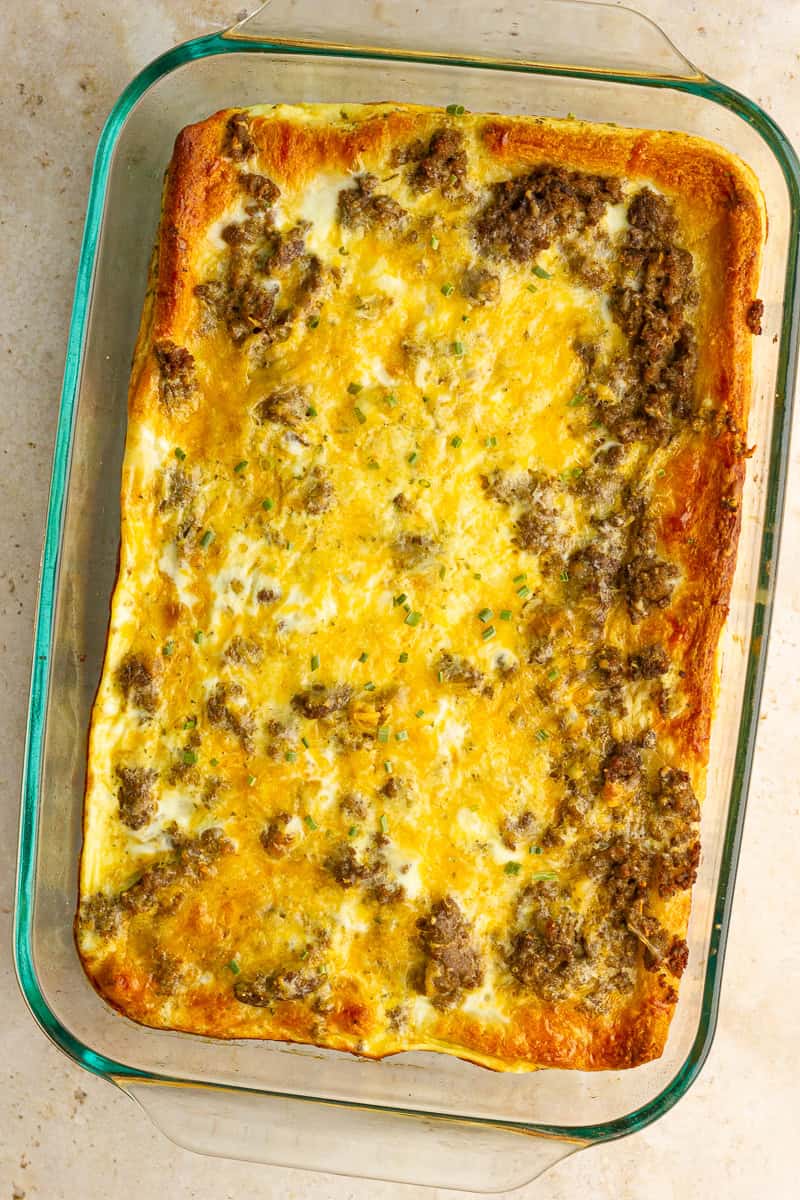 Golden breakfast casserole with crescent rolls, sausage, and melted cheese fresh out of the oven.