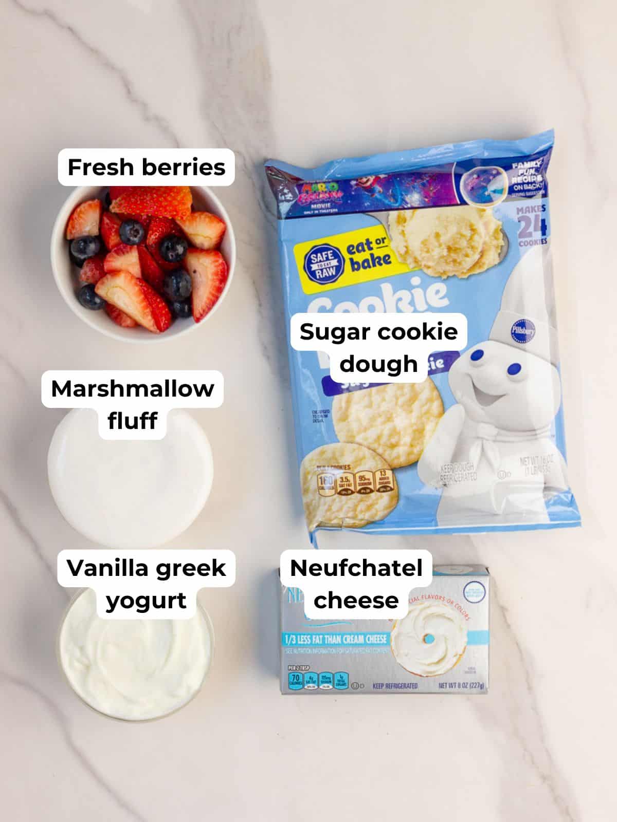 Sugar cookie dough, marshmallow fluff, Greek yogurt, Neufchâtel cheese, and fresh berries for fruit pizza cups.