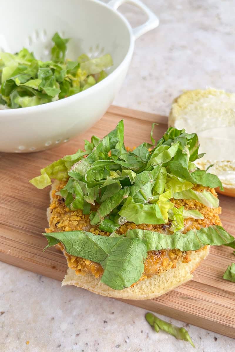 Homemade McChicken sandwich topped with shredded lettuce on a brioche bun.