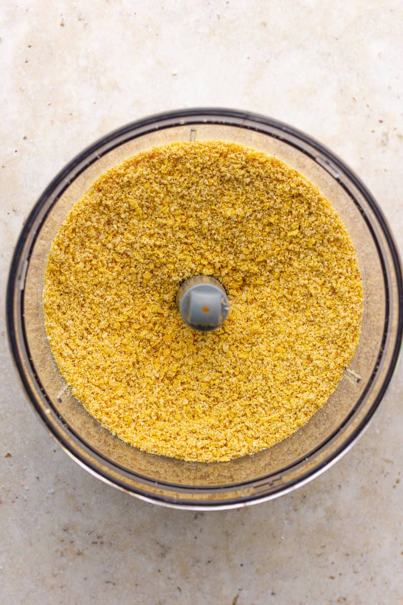 Crushed cornflake breading blended with seasonings in a food processor.