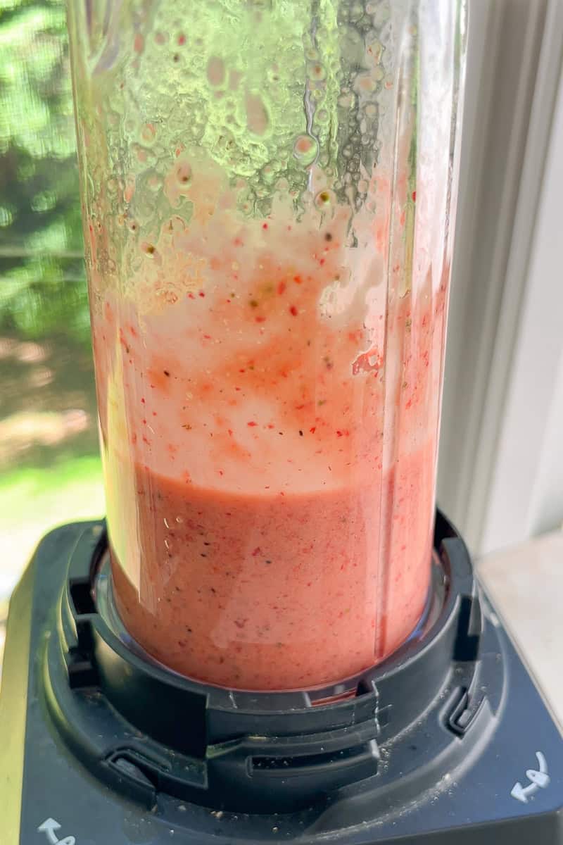Strawberry poppyseed dressing blends in a blender until smooth and creamy.